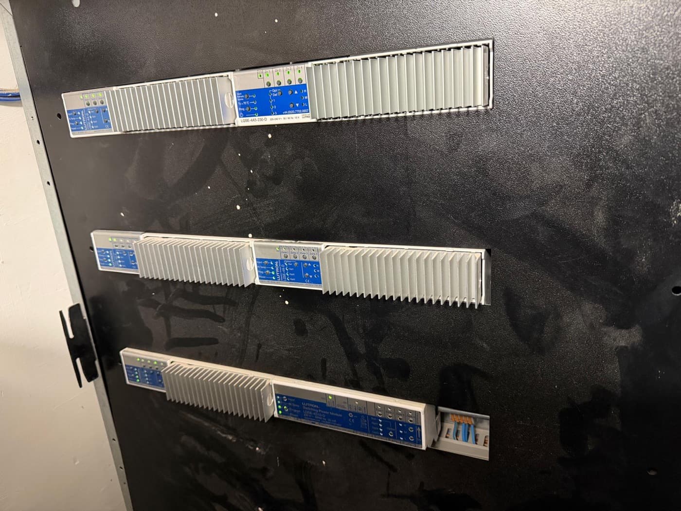 Dimmer modules mounted and wired inside a lighting control cabinet