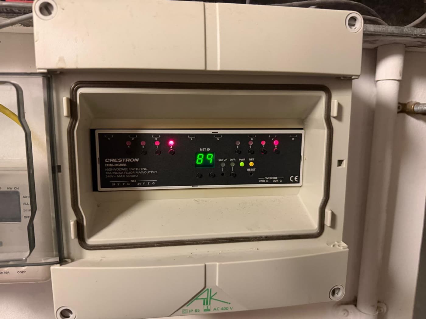 Crestron lighting control module wired into a sealed enclosure