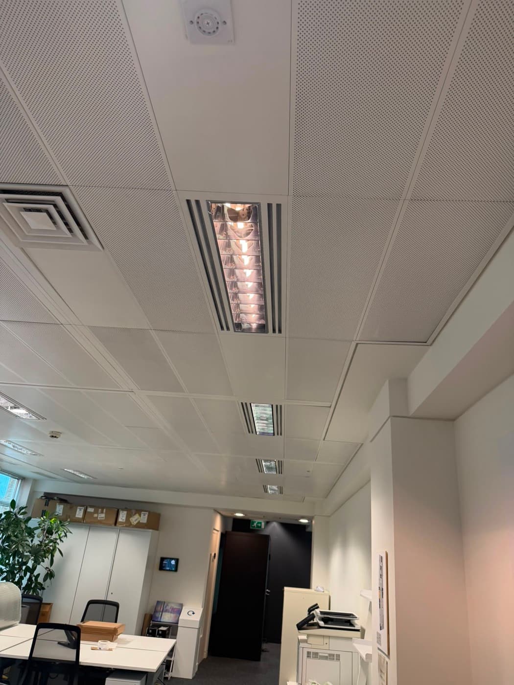 Recessed lighting fitted in a suspended office ceiling